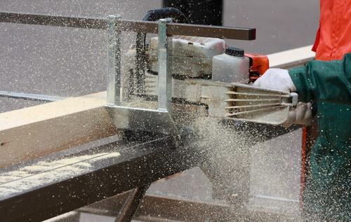 Close-Up of Chainsaw Milling in Action