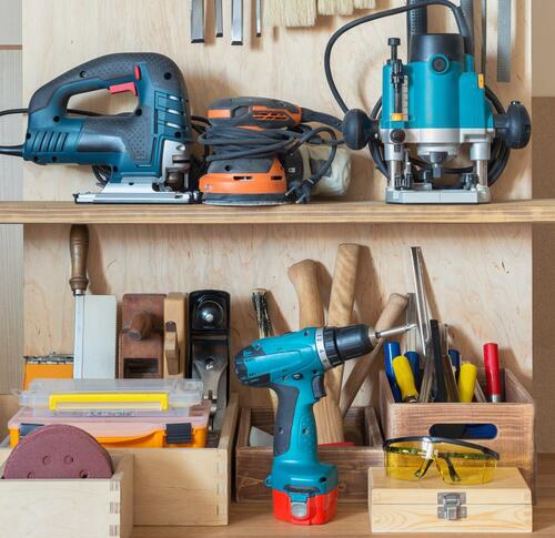 Organized Power Tools and Accessories on Shelf