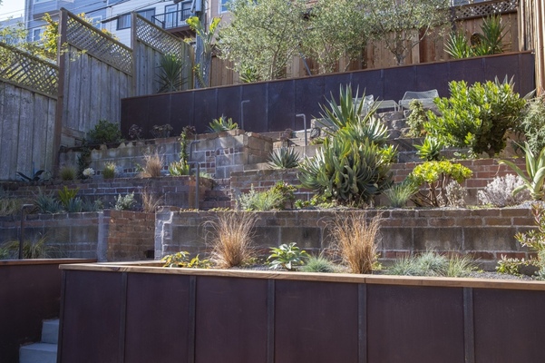 What Goes Into Building a Retaining Wall (And Why You Should Hire Professionals for the Job)
