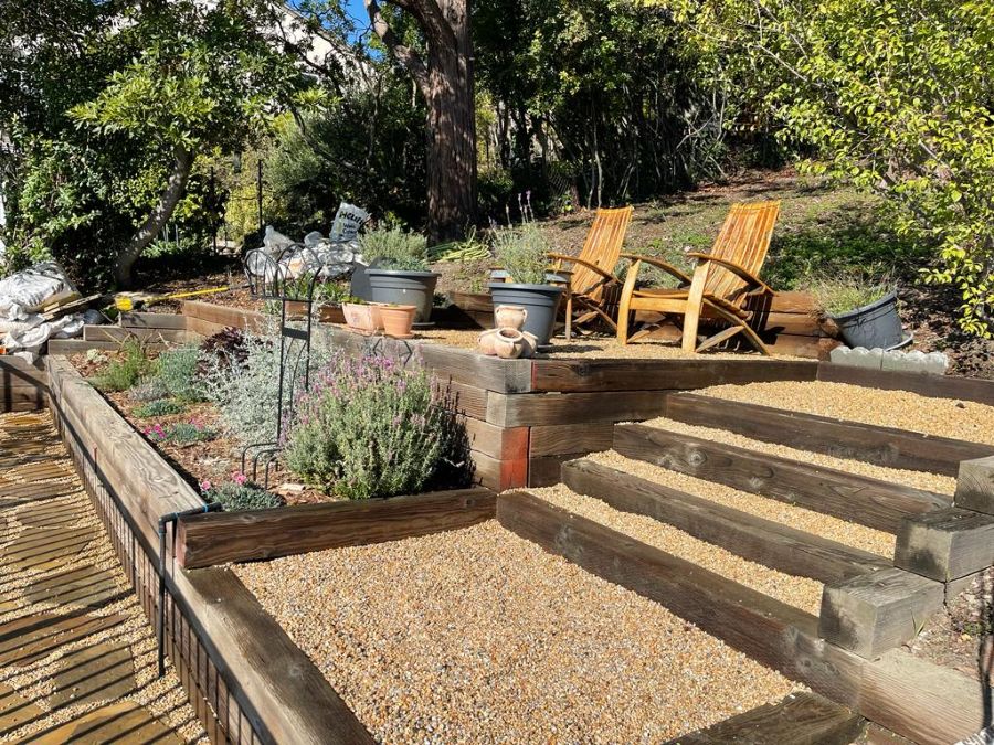 Arborist Now urban wood landscape installation in San Francisco featuring custom timber steps and site furnishings for a commercial outdoor project.